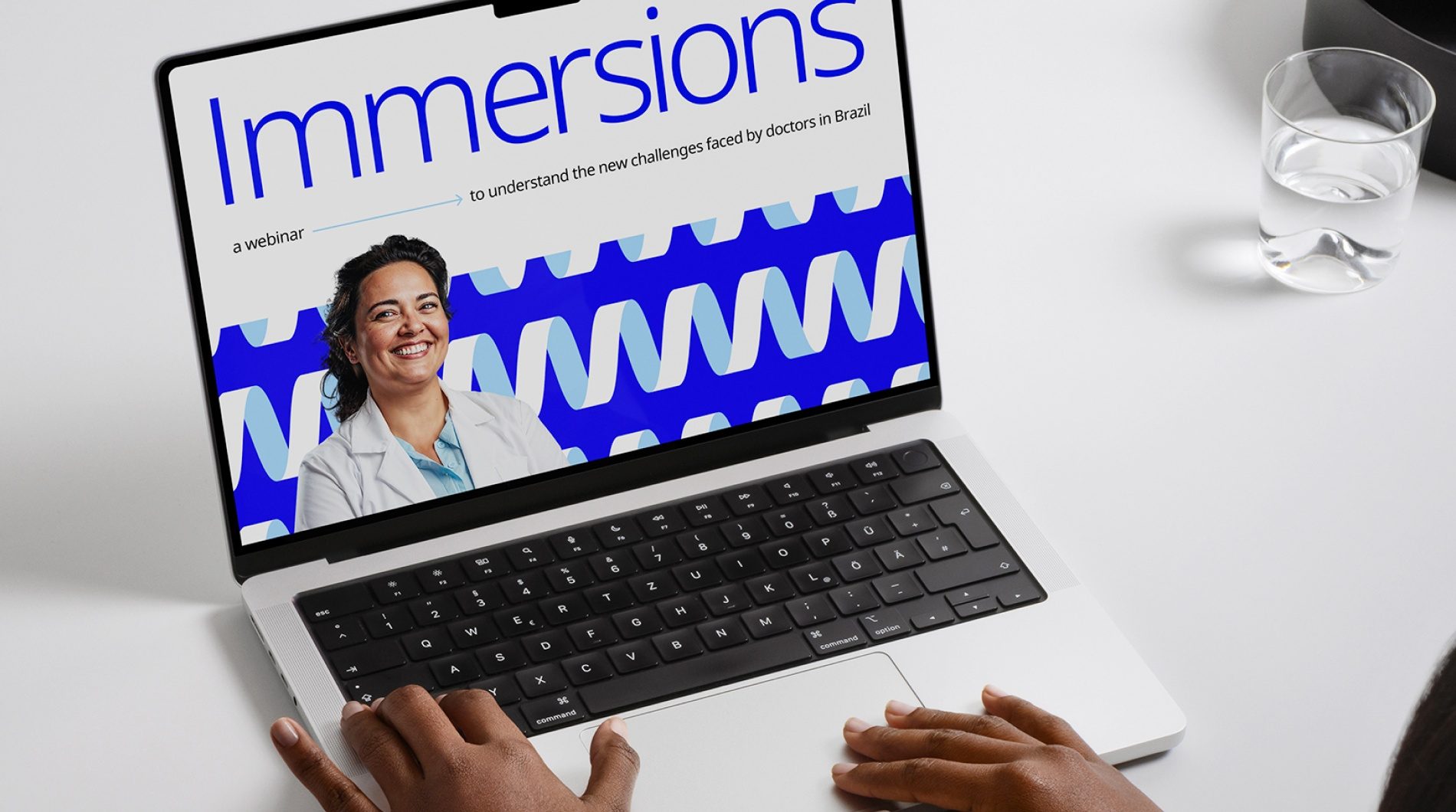 Notebook com a página de Immersions, um webinar do In